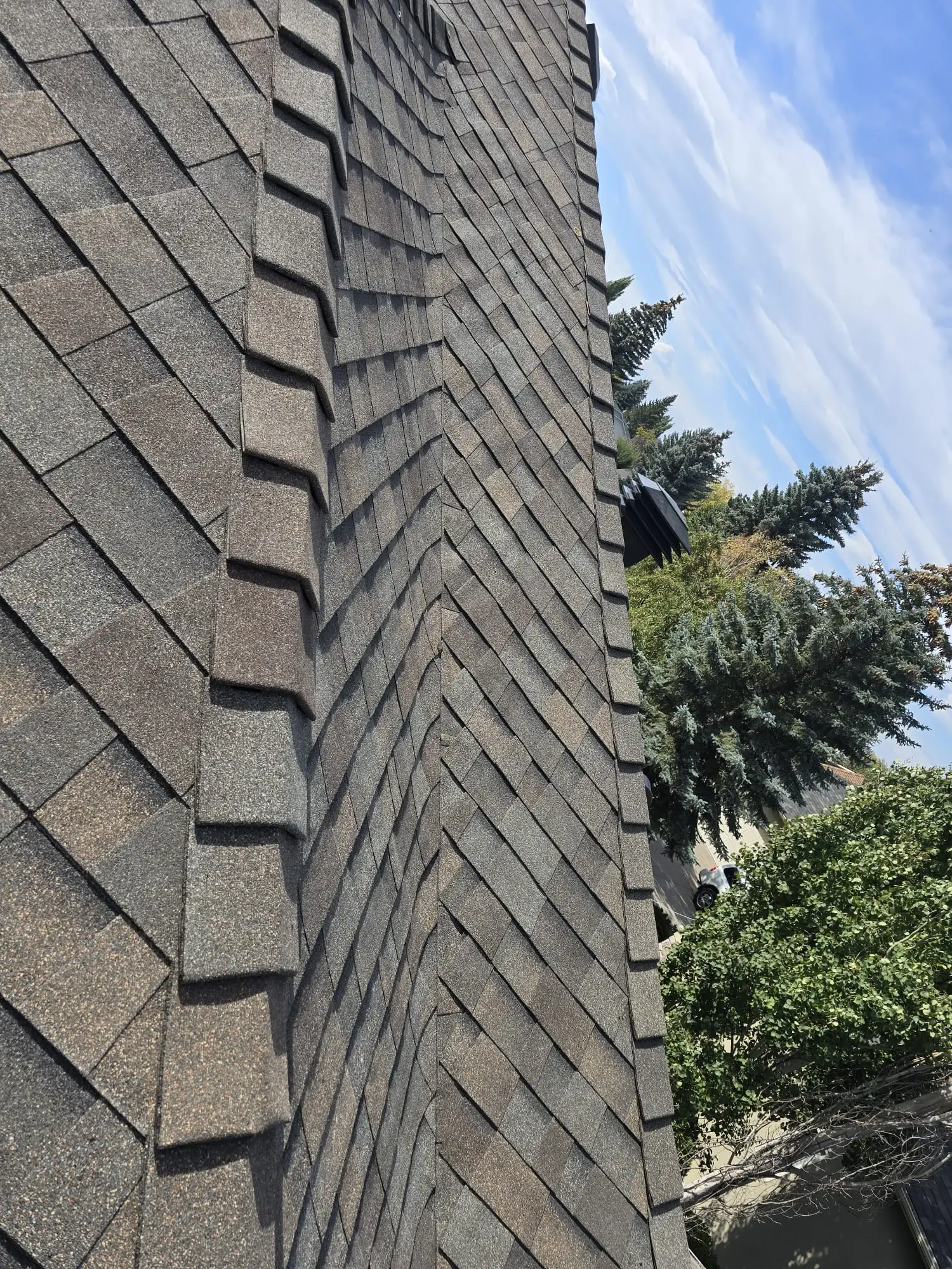Malarkey Vista natural wood Class 4 impact-resistant shingles on a Calgary roof