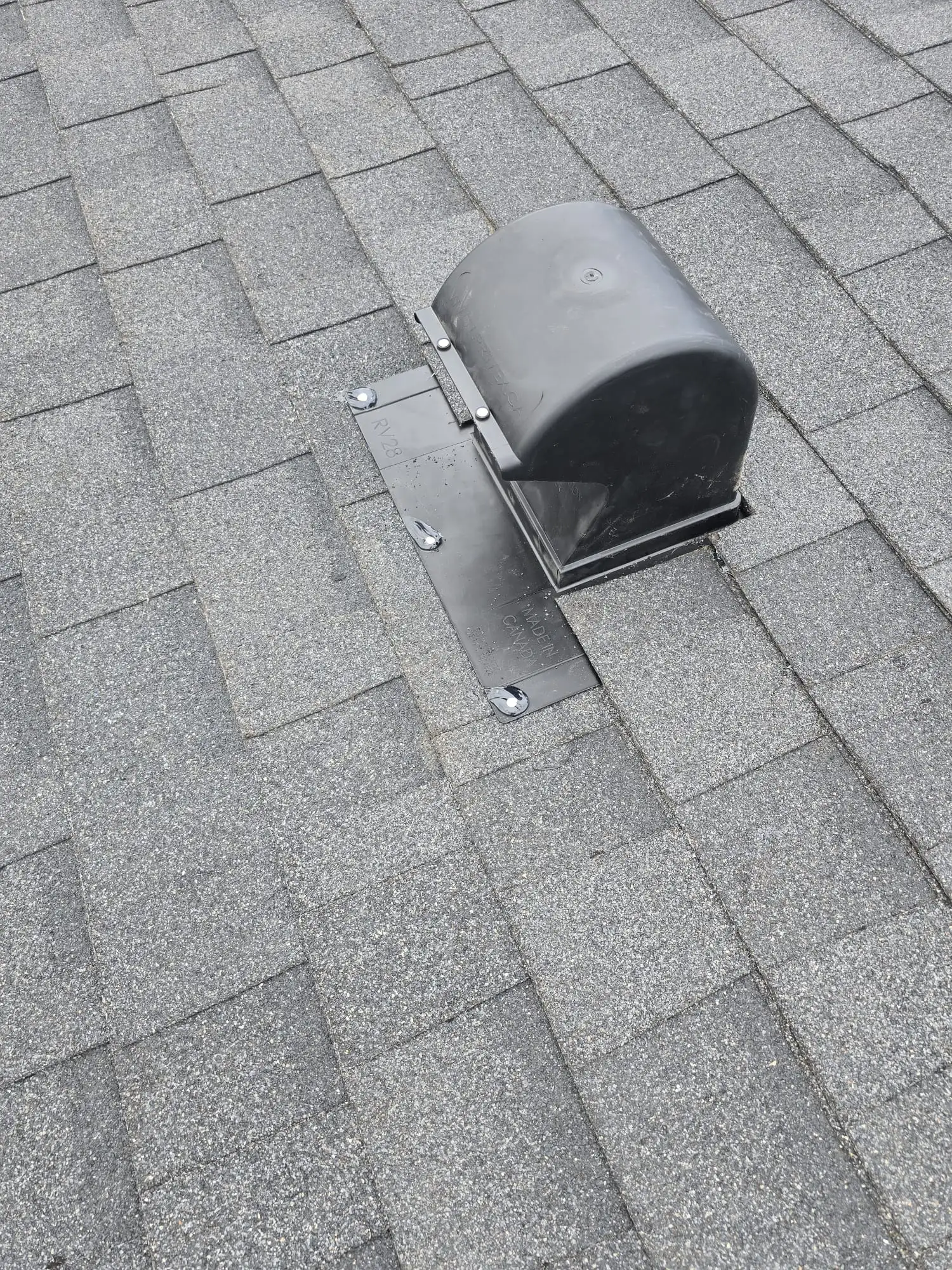 Turtle roof vent with exposed nails flagged during a Calgary roof inspection